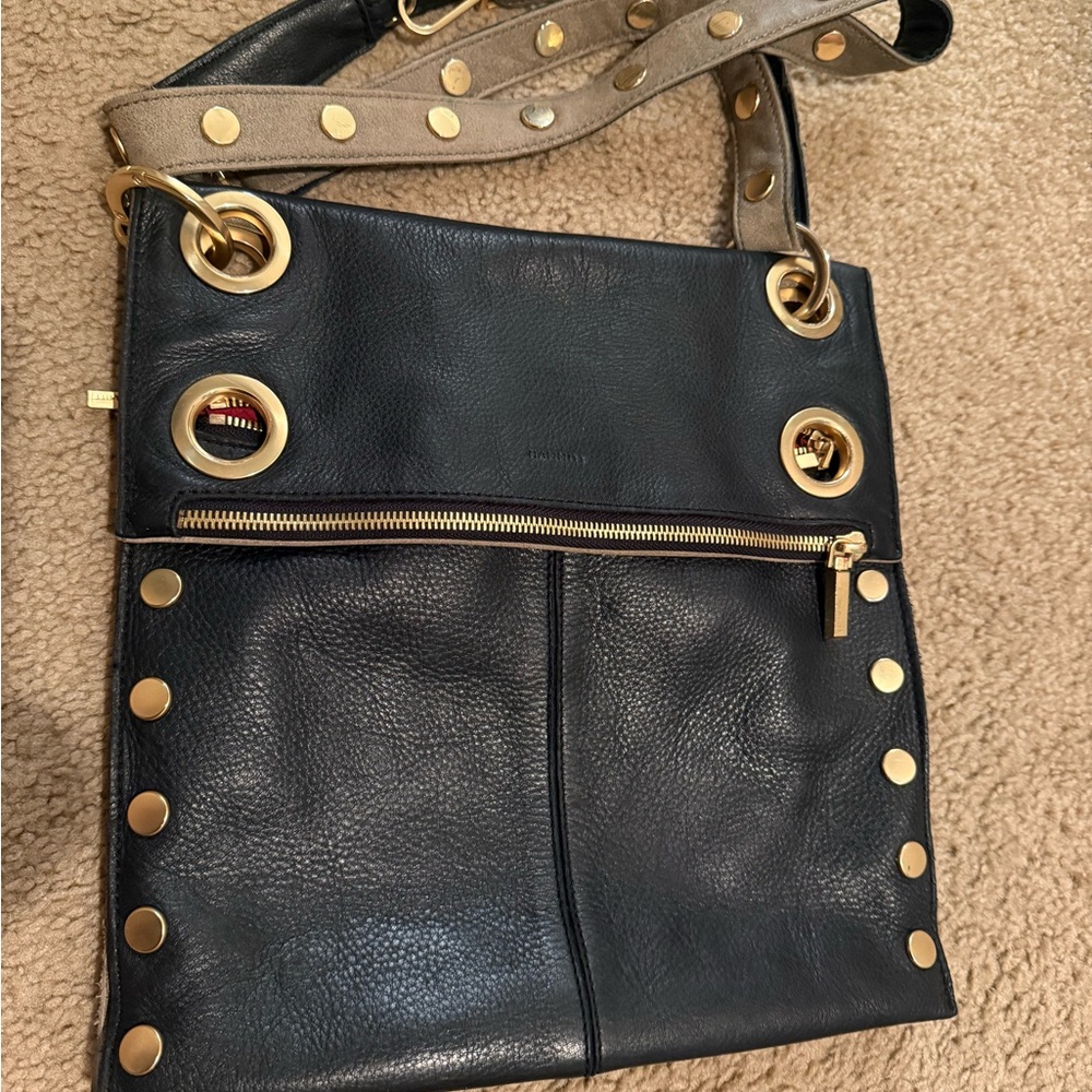 Hammitt Montana Lg Reversible leather purse with gold plated accent.